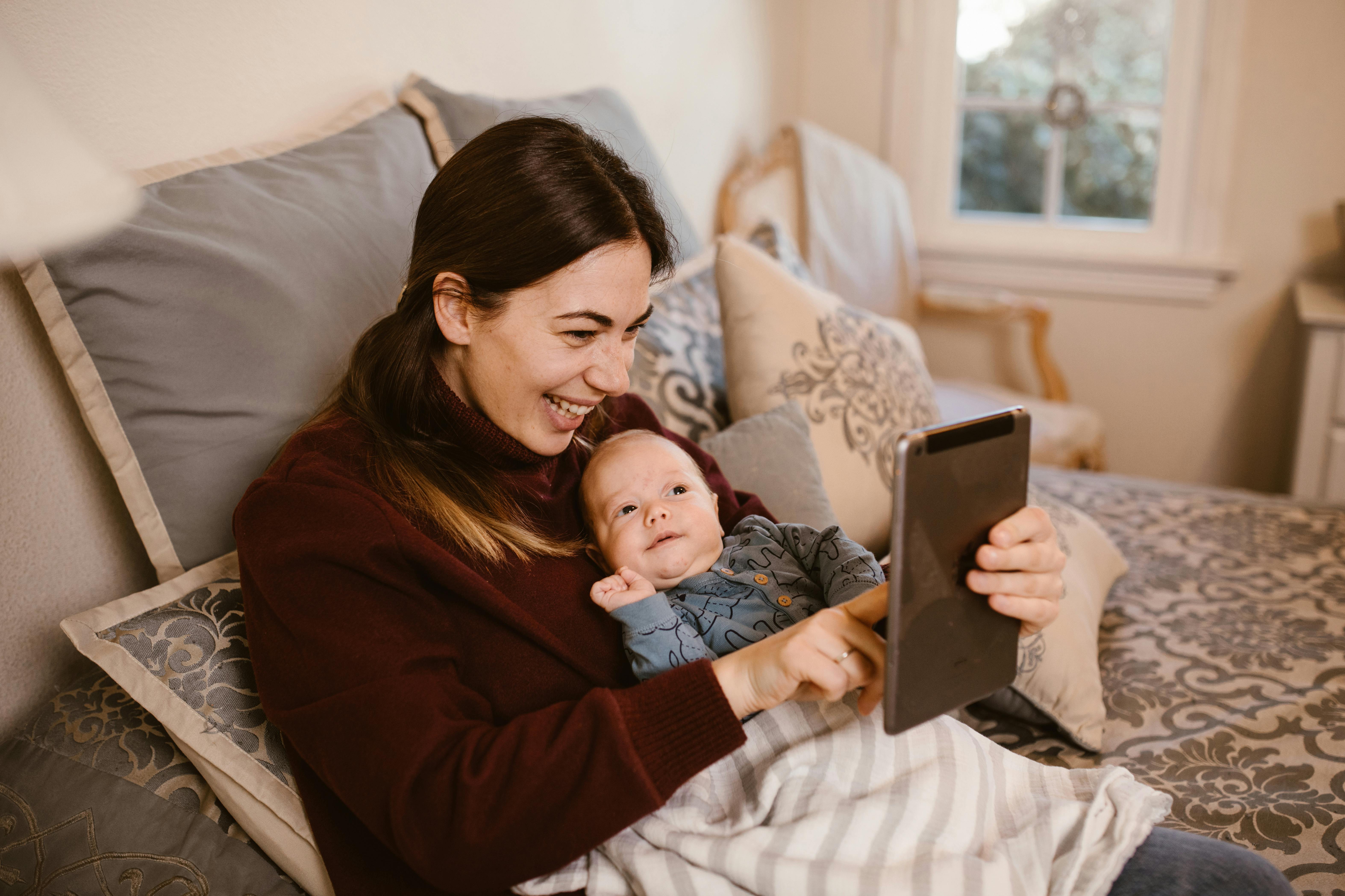 Parent searching for childcare online using Best Start hub on tablet